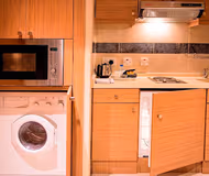 Fully equipped kitchen at Khalid Bin Al Waleed Street Serviced Apartments