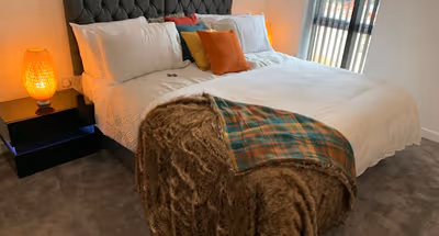 Master bedroom at Lakeside Two Bed Luxury Flat No Parties No Events