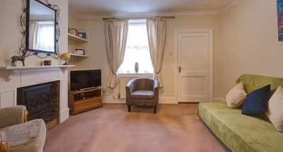 Comfy living room at Pansy Cottage