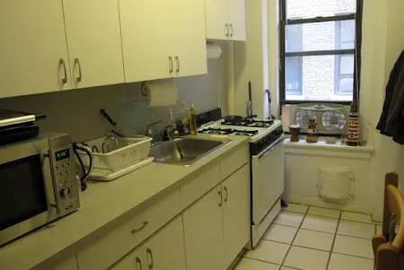 Fully equipped kitchen at West 55th Street Apartment