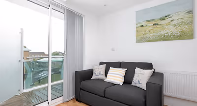 Comfy living space at Tower Point Apartments in Enfield