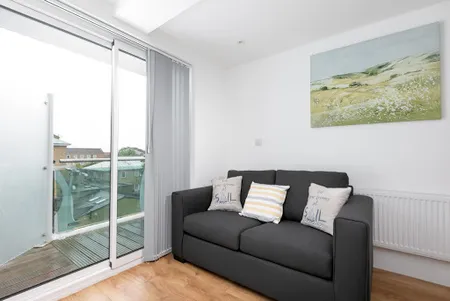 Comfy living space at Tower Point Apartments in Enfield