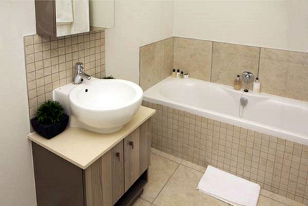 Bathroom at De La Rey Street Apartments