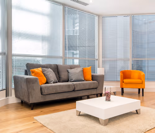 Living area at Heathrow Lodges by MySquare