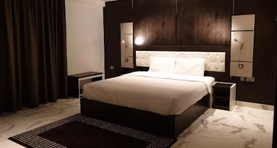 Bedroom at Al Ghubrah Street Serviced Apartment