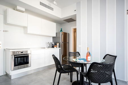 Full kitchen at Allenby Street Serviced Apartment