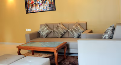 Simplistic living area in Rakshak Nagar Apartments