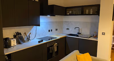 Fully equipped kitchen in Studio apartment at Colourful one bedroom apartment