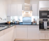 Integrated microwave and oven 