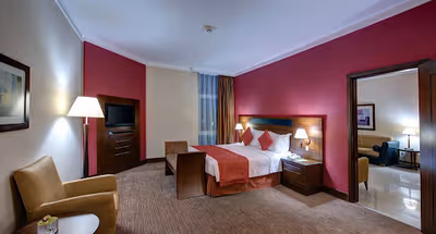 Luxury bedroom at Al Muraqqabat Street Serviced Apartments