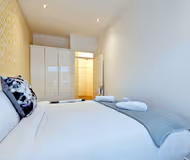 Bedroom at City Center apartment