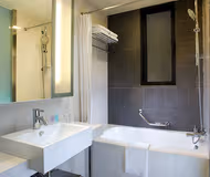 Bathroom at Citadines Xinghai