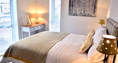 Double bed bedroom at Westlake Apartments