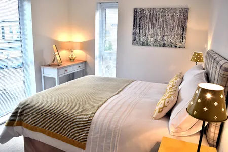 Double bed bedroom at Westlake Apartments