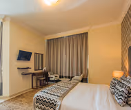 King sized bedroom at Dorra Bay Residence Serviced Apartment, Dubai Marina