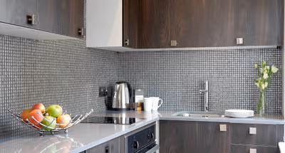Fully equipped kitchen at Nevern Place by Supercity Aparthotels