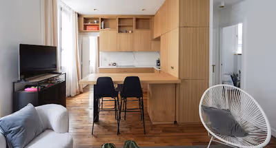 Dining area at Design apartment at the top of the Marais