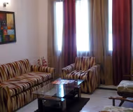 Spacious living area at Safdarjung Luxurious Serviced Apartments