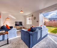 Living area at Modern 4 Bedroom Apartment