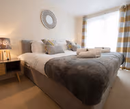 King sized bedroom at Drummond Apartment