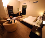 King sized bedroom at Clock Tower Street Serviced Apartments, Deira