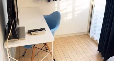 Simplistic living area in 2-11 Roppongi Apartments