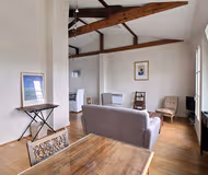 Simplistic living area in Eiffel View Serviced Apartment, Palais-Bourbon