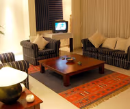 Cosy living area in Indiranagar Serviced Apartment in Bengaluru