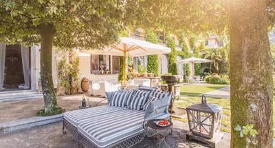 BASKING IN SUNSHINE WITH 180° LAKE VIEWS OVERLOOKING THE MAJESTIC MOUNTAINS & COMO
