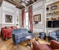 Bright living room at CUSTOM-BUILT AND EXQUISITELY DESIGNED ODEON SUITE SAINT GERMAIN