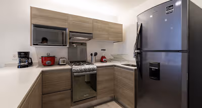 Fully equipped kitchen in Studio apartment at CHANDELIER II