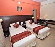 Simplistic living area in Electronic City Serviced Apartments in Bengaluru