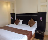 Bedroom at Al Mansour Street Serviced Apartment