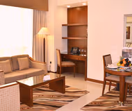 Simplistic living area in Al Rawda Arjaan Serviced Apartments, Nahyan Camp