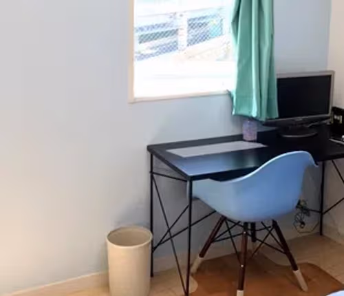 Simplistic living area in 2-11 Roppongi Apartments