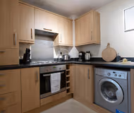Fully equipped kitchen at Drummond Apartment
