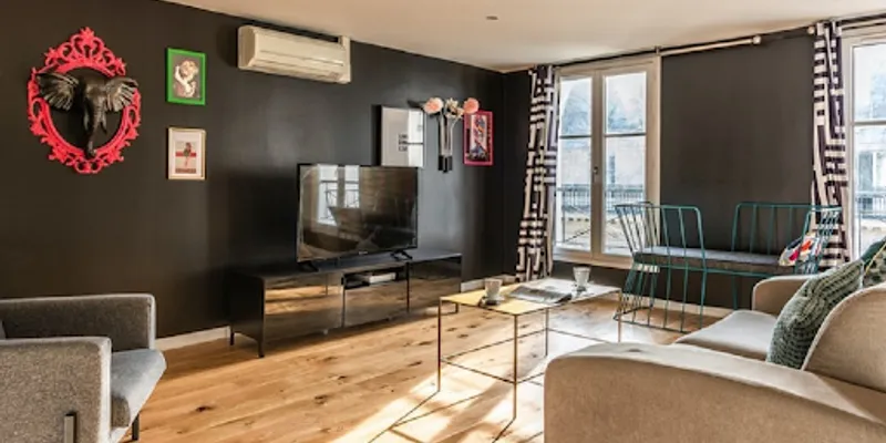 SURROUNDED BY THE BEST OF PARISIAN CULTURE-TUCKED BEHIND CHAMPS ELYSEES
