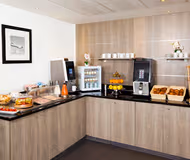 Fully equipped kitchen at Roissy Village Serviced Apartment, Champs Elysees