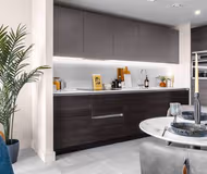 Fully equipped kitchen at The Mercian 1 VII - 1BDR | Games room | Sky Lounge