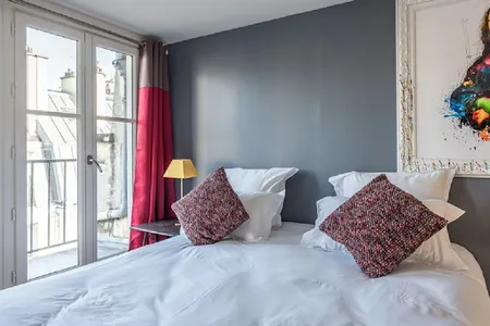 SURROUNDED BY THE BEST OF PARISIAN CULTURE-TUCKED BEHIND CHAMPS ELYSEES