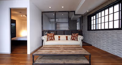 Simplistic living area in Ooyamacho Serviced Apartment
