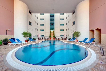 Pool side at Omar Bin Al Khatab Street Serviced Apartments, Deira