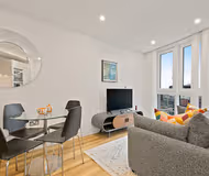 Living area at Aldgate Apartment by MySquare