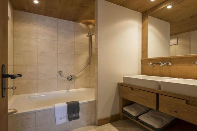 NESTLED JUST OFF THE SKI LIFT WITH ELEVATED VIEWS OF THE VALLEY OF VERBIER