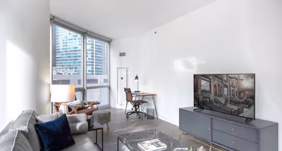 Spacious living area at North Park Drive #1001 Serviced Apartment, Streeterville