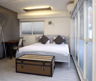 Simplistic living area in Minatoku Serviced Apartment