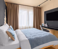 Cosy bed at numa I WOOD Rooms &amp; Apartments Wien