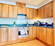 Stylish Riverside Apartment with Parking