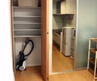 Simplistic living area in Minato-Roppongi Apartments