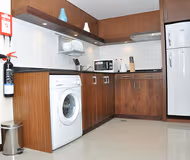 Basic kitchenette at Airport Road Serviced Apartments, Al Nahyan